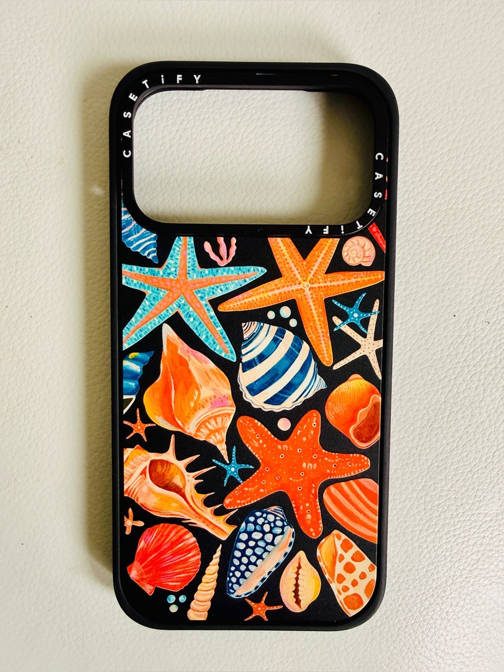 Casetify Black Seashell & Starfish Phone Case - Orange & Blue Accents